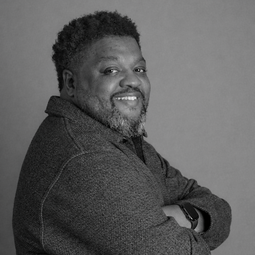 Ray Coleman, accountant at Harmony Design Group, smiles at the camera.